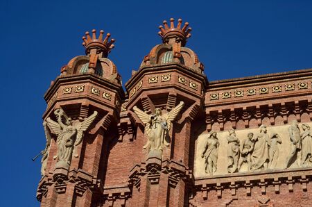 Details of Triumphal arch with figures of angels and people built for entrance to 1888 Barcelona Universal Exposition,Catalonia,Spainの写真素材