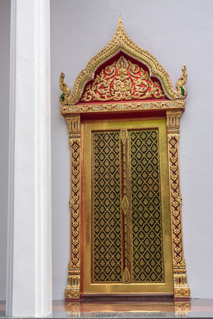 Thai painting art pattern adorned to window and door templeの写真素材