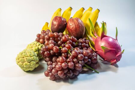 Fruits from Thailand, banana, dragon fruit, rose apple, grapes, custard apple are delicious taste, fragrant, sweet, beneficial to health they are popular for foreign tourists.の写真素材