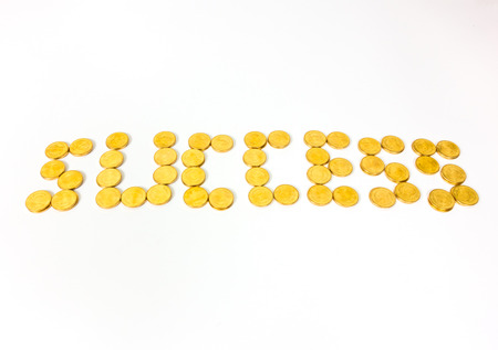 Sort the gold coins medal success on white backgroundの写真素材