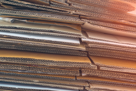 Stack boxes recycled paper under the light.