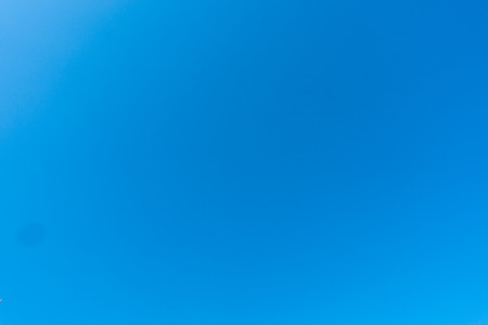 The cloudless blue sky background.の写真素材