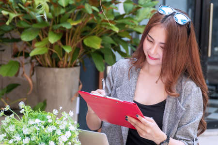 Charming young woman smiling look like thinking about something to use her idea with copy space....