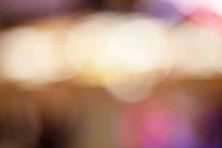 Abstract blurred soft bright light bokeh in department store. Defocused shiny colorful circle light in the mall. Background concept.の写真素材