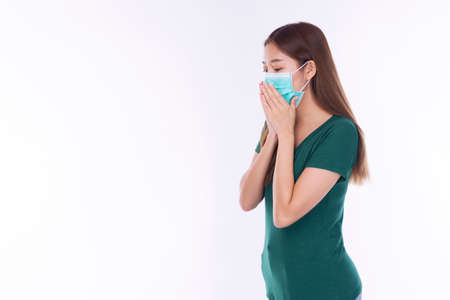 Student young woman wearing safety medical mask protection from inhaling airborne bacteria or virus...