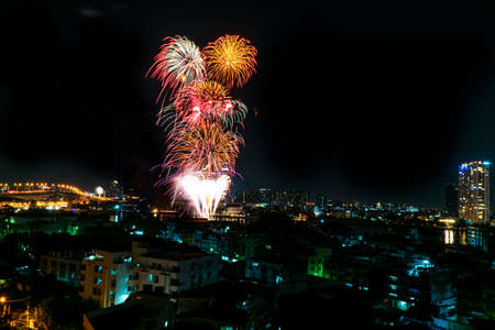 2021 January 01 Thailand, Bangkok Beautiful Fireworks in Happy new year on midnight sky over river with landscape city and bridge. Festival celebration concept.のeditorial素材