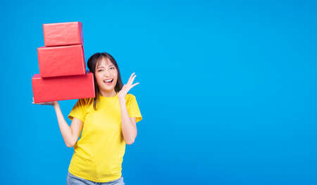 Surprise greeting anniversary birthday or celebration christmas and new year. Cheerful excited young...