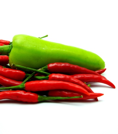 Red Hot Chili and Green Bell Pepper on White Backgroundの写真素材