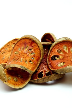 Dried Bael Fruit on White Backgroundの写真素材