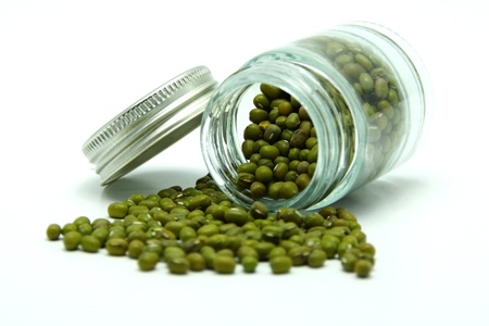 Green Mung Bean in Bottle on White Backgroundの写真素材