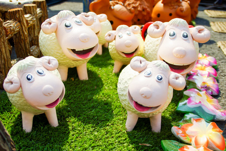 Ceramic Sheep Doll Family Decorated in Gardenの写真素材