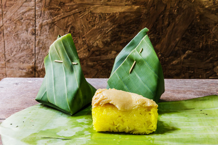 Rice custard, dessert Thailand wrapped in banana leaves.の写真素材