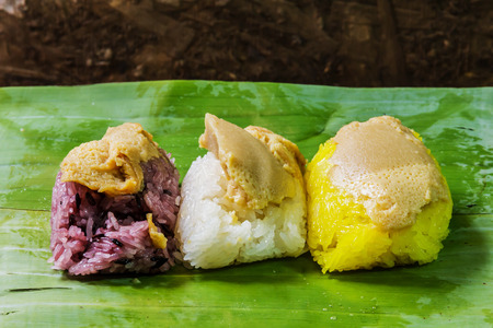 Rice custard, dessert Thailand wrapped in banana leaves.の写真素材