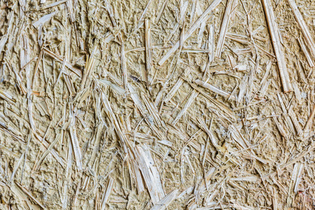 Patterned walls made â€‹â€‹of straw and clay for use as a background.