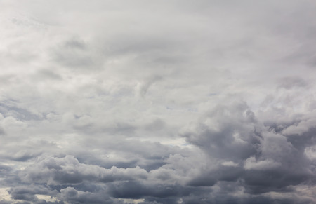 Partly cloudy sky with rain storm.