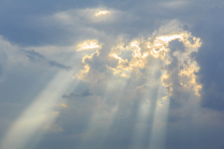 background of divine light sky and storm clouds before a thunder-stormの写真素材