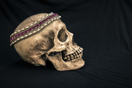 Still life with a human skull with the old, in with the diamond and jewelry used as illustrations on Halloween Lavigne.の写真素材