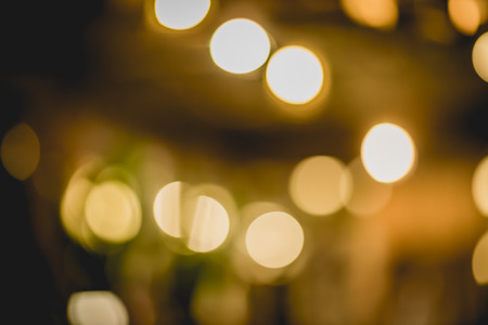 Abstract circular bokeh lighting in the night can be used for background and text input