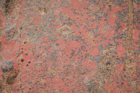 Wall surface rust and old paint cracks as a background for the text.