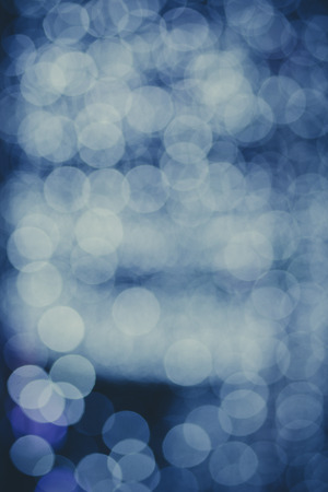 Christmas background with Lights on blue background.の写真素材