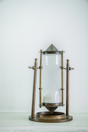 Hourglass isolated on white background white use compare time