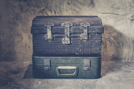 Old iron chest on the background wall vases with dried flowers and vintage style.の写真素材