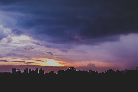 Romantic sunset sky with fluffy clouds and beautiful heavy weather landscape for use as background images and illustrations.の写真素材