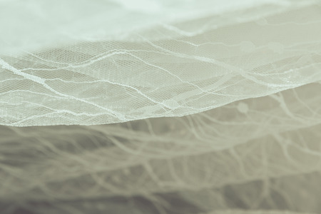 Details of the bride dress fabric and beautiful embroidery wedding concept used as a background for illustrations and text.の写真素材