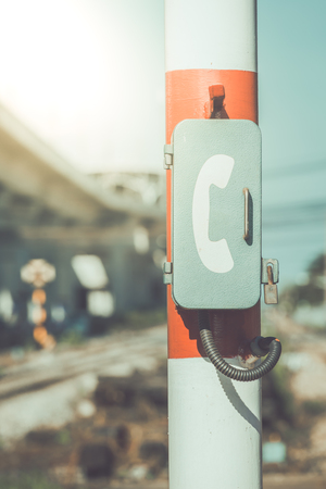 Emergency call at the train station to assist with initial communication.の写真素材