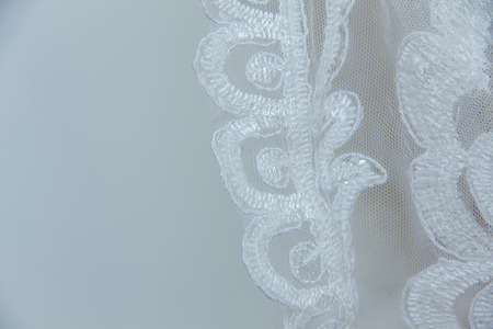 Beautiful embroidery pattern used as a component in bridal gown for wedding ceremony.の写真素材