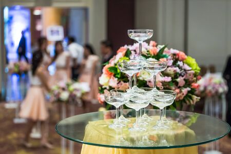 Wine glasses group at the wedding and happy group of people