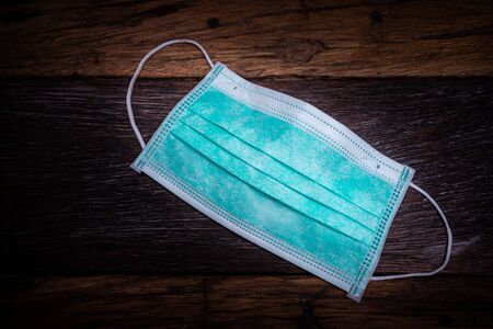 The surgical mask with covid 19 spread around the world. Impact of pandemic virus infection which...