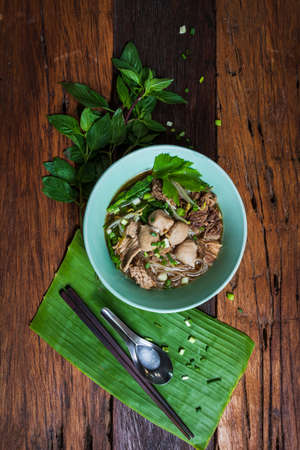 Noodles with Beef and Beef balls with soup Thai style. Food that is popular with Thai people.