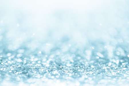 blue glitter background. Abstract Shiny glitter bokeh christmas background.