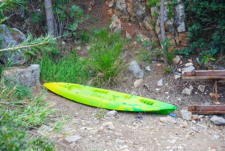 single surf board laying at the palmbay of Sisi, Crete, Greeceの写真素材