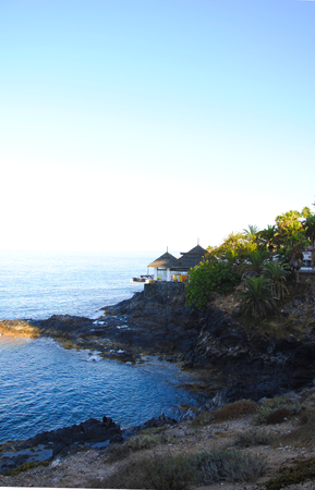 the rocky and sandy coast of Tenerife. Tenerife is one of the canary islands. the canary islands belong to spain.の写真素材