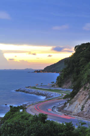 Road along the coastline by twilight at Ao Kung Viman Bay Eastern Thailand の写真素材
