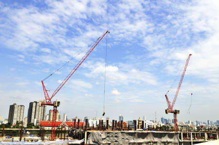 Cranes on construction site for shopping mallのeditorial素材