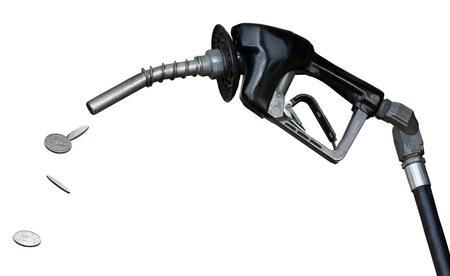 gas nozzle pouring moneyの写真素材