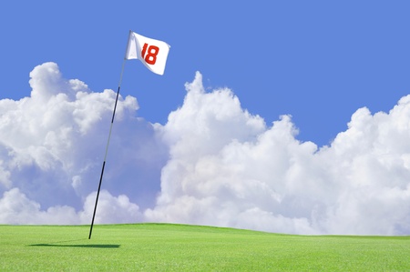 Golf course flag at hole 18の写真素材