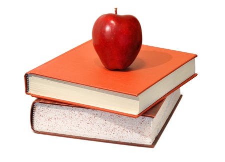 Red apple and educational science textbooks; food for the body and mindの写真素材