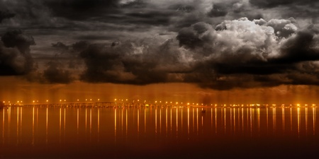 Night lights from a modern city reflecting on water