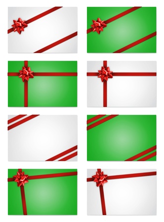 Holiday greeting note cards with red gift bows and ribbonsの写真素材