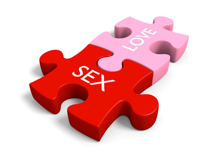 Sex and love puzzle pieces for sexual education and sensuality themesの写真素材