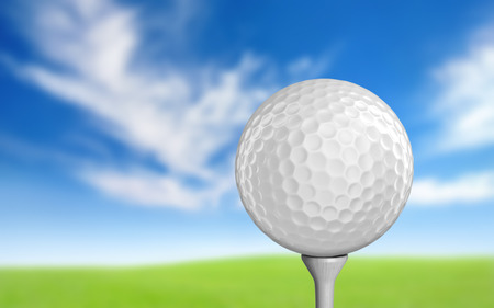 Plain white golf ball sitting on a teeの写真素材