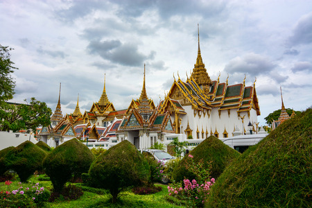 Landscaping and beautiful architecture at the historic Grand Palace in Bangkok, Thailandのeditorial素材