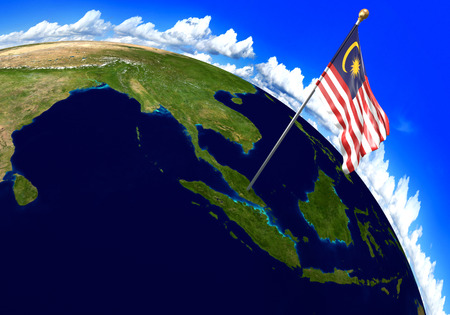 Malaysia national flag marking the country location on world map. 3D rendering, parts of this image furnished by NASAの写真素材