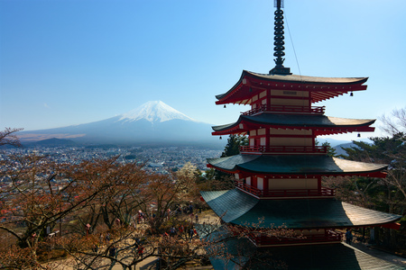 FUJIKAWAGUCHIKO, JAPAN - APRIL 14, 2017 - The famous five-storied Chureito Pagoda stands in front of Mount Fuji on a warm spring day in Japanのeditorial素材