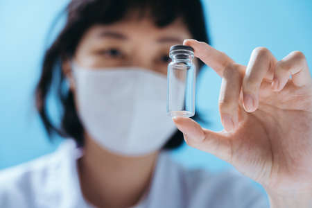 Close up inspection on laboratory tools. Empty space in studio shot isolated on colorful blue...