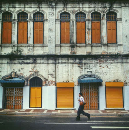 Man running along the street